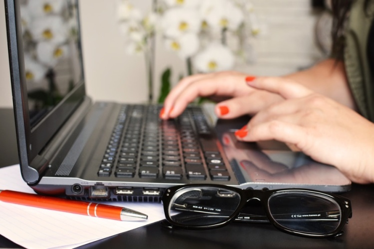 person-woman-desk-laptop-large
